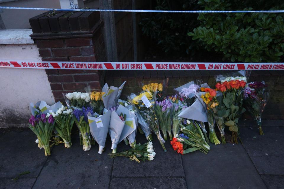  Floral tributes left at the scene for 'absolute icon' Harry