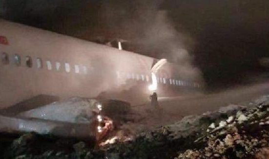 Dramatic photos appear to show smoke billowing from the cabin