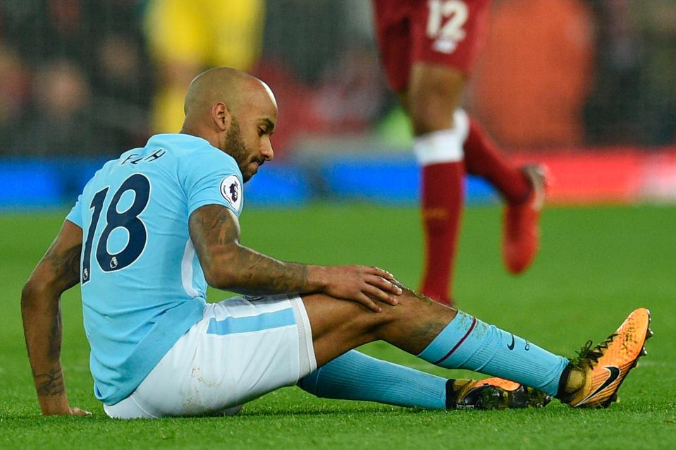  Fabian Delph appeared to injure his knee after stretching for the ball