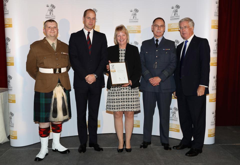  Prince William with representatives from Dundee City Council and Michael Fallon as they attend an MOD Employer Recognition Scheme Gold Awards Event