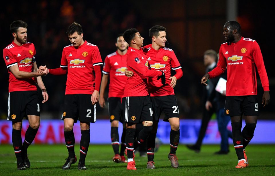 Manchester United players celebrate after beating Yeovil in fourth round