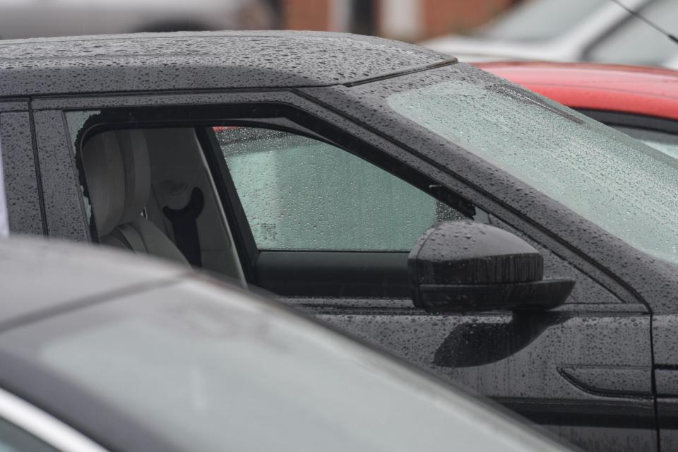  A car was spotted nearby with a smashed-out drivers side window