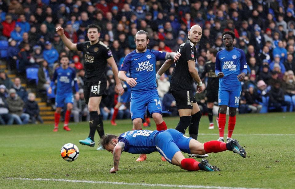  Danny Lloyd attempts to get on the end of a deep cross into the Leicester box