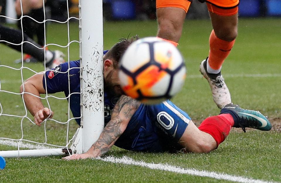  Danny Lloyd's neck crunched into the London Road post as he searched for a goal to get Posh back into the game