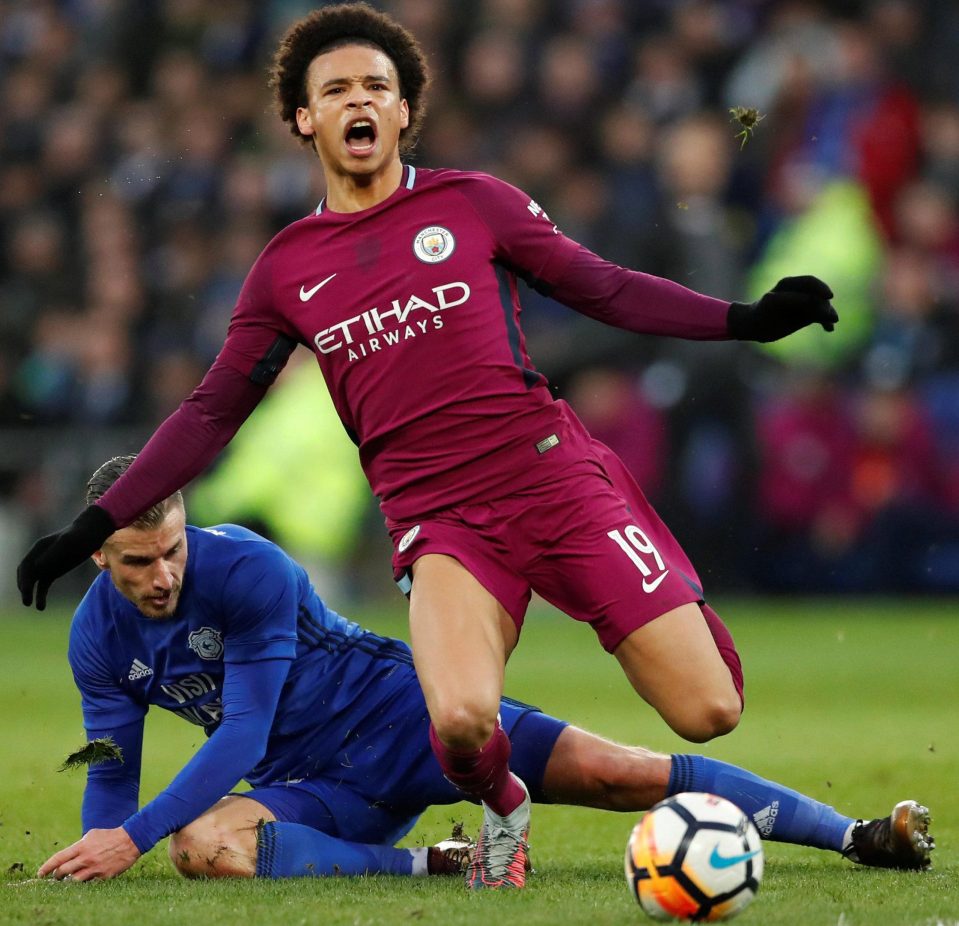  Leroy Sane feels the full force of Joe Bennett