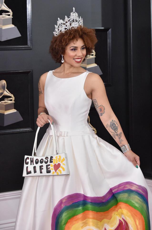  She paired the outrageous frock with a white Choose Life handbag