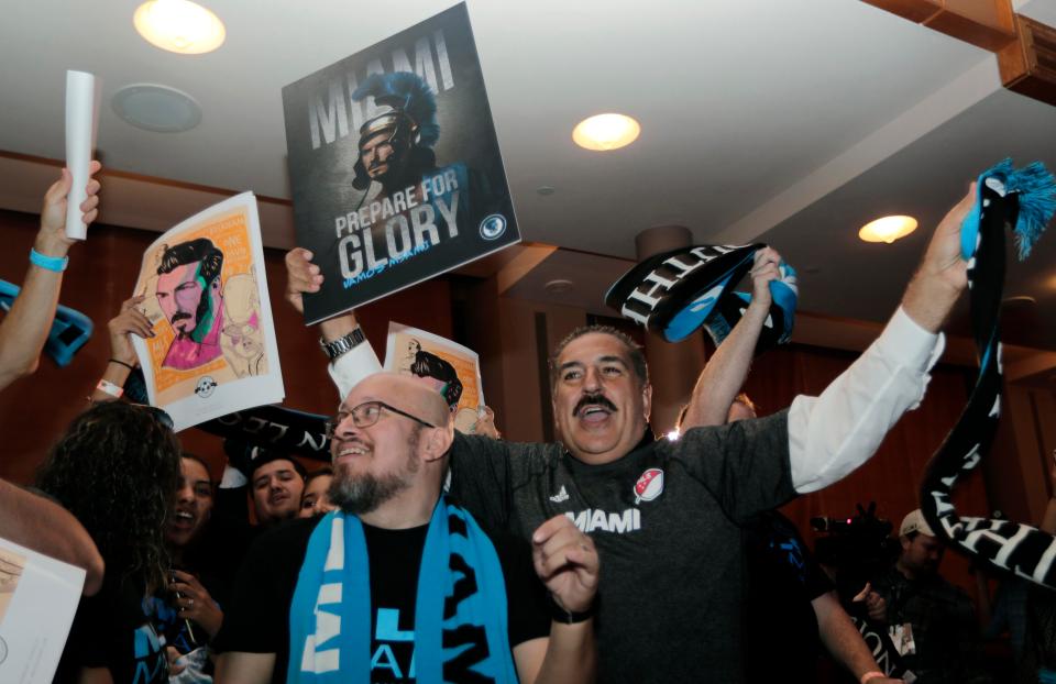 Miami fans celebrate after their cityh was granted an MLS team