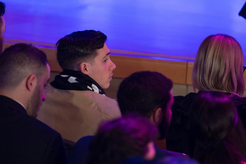 Beckhams son Brooklyn on the front rwo during the press conference 