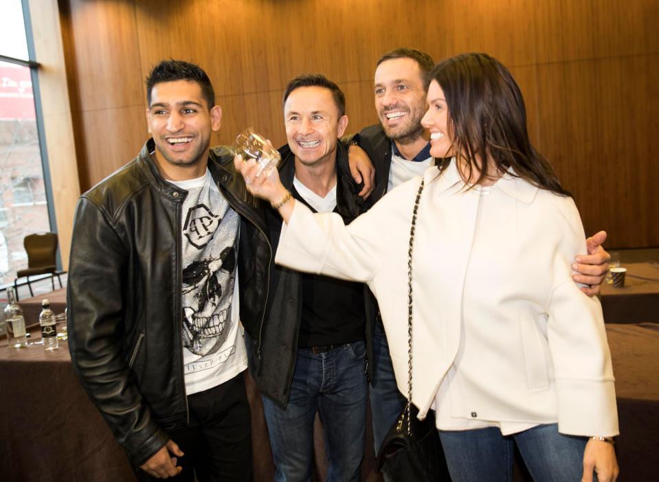  Rebekah Vardy jokes with Amir Kahn backstage and pretends to throw water at him, watched by I'm A Celeb pals Dennis Wise and Jamie Lomas