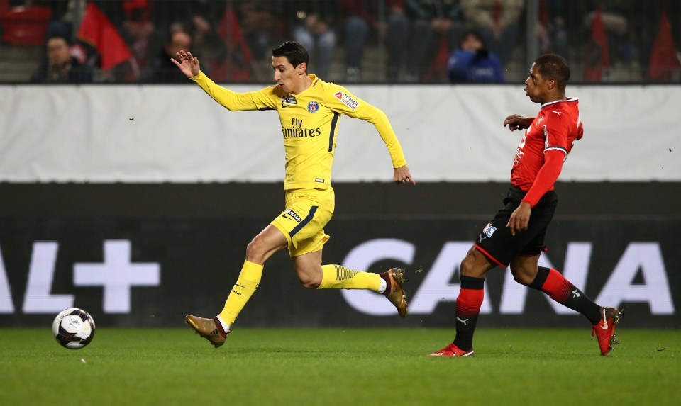 Angel Di Maria runs at the Rennes defence