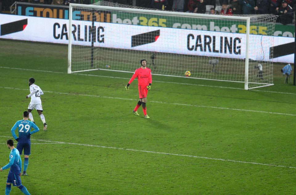  Jordan Ayew celebrates as he scores past Petr Cech at Liberty Stadium