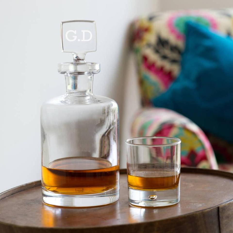  Go one up on that and give him his very own monogrammed decanter