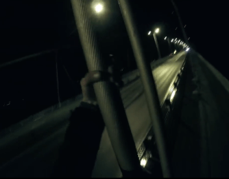  The Polish daredevil starts climbing the bridge in the pitch-black early hours of the morning