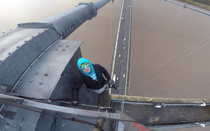  He posed at the top of the bridge's 500ft South Tower