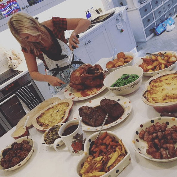  Holy served Christmas lunch in a crisp white kitchen from Emma Bridgewater plates