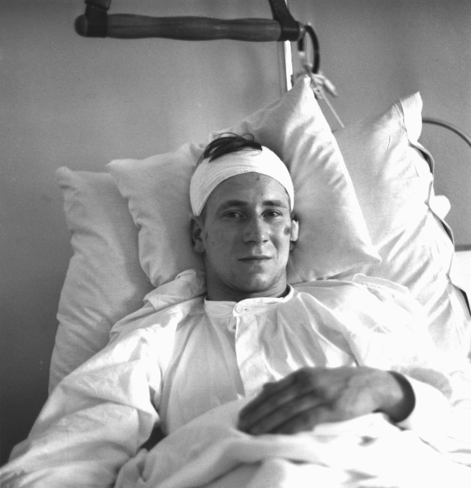 Sir Bobby Charlton in a hospital bed after surviving plane crash in 1958