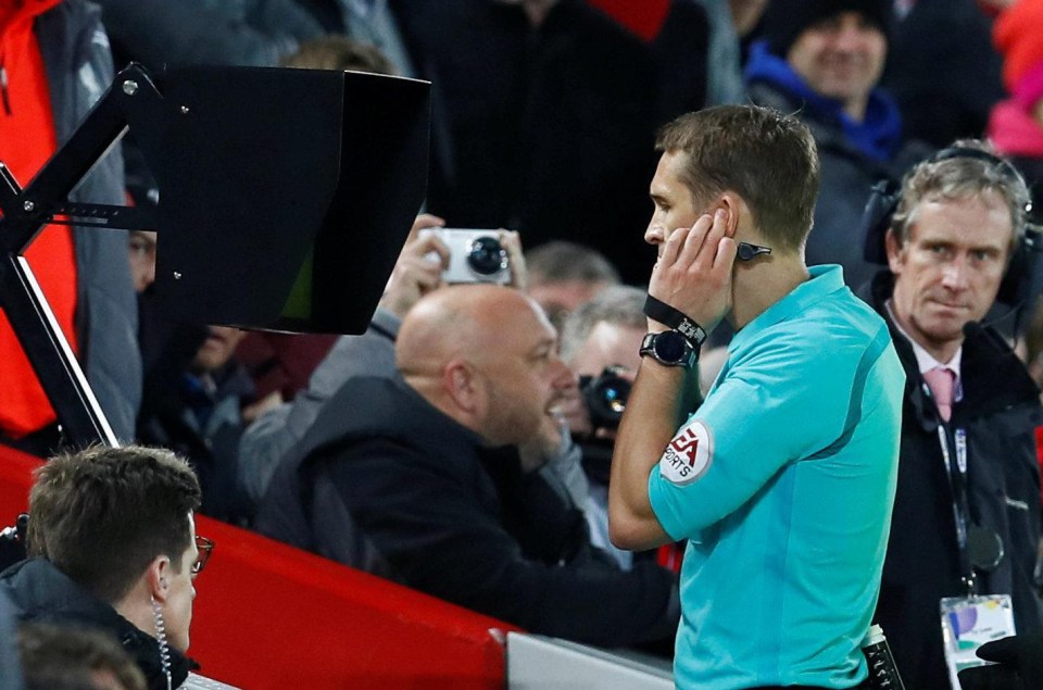 Referee Craig Pawson watches a monitor before awarding Liverpool penalty in a 3-2 win for West Brom that highlighted mixed views on VAR technology