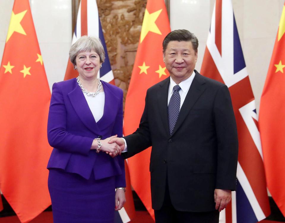  Theresa May hails historic trade talks with Chinese President Xi Jinping