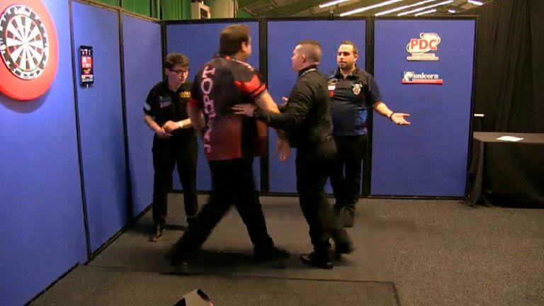 A furious confrontation erupted on February 2 at the end of their UK Open Darts qualifier