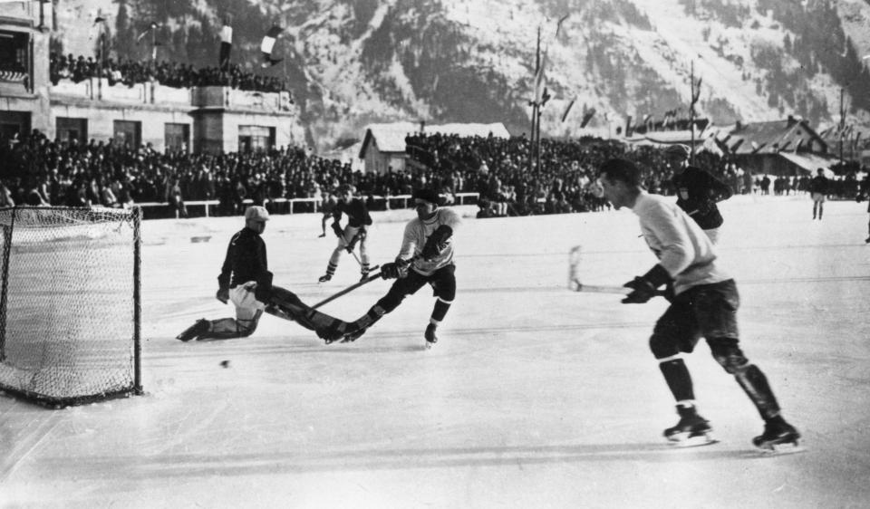  Crowds gather to watch the ice hockey competition at the first ever Winter Olympics