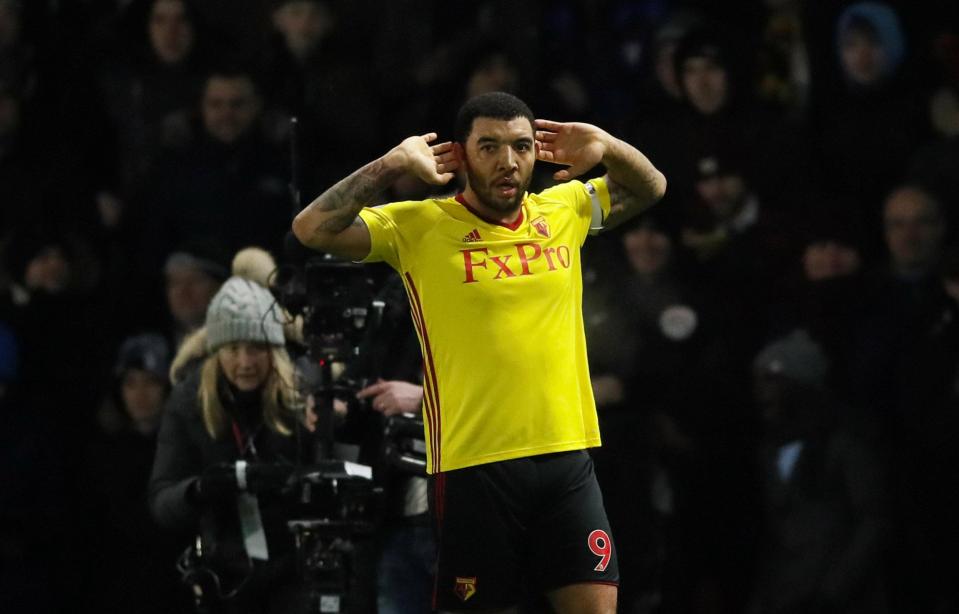  Troy Deeney celebrates netting his first-half penalty