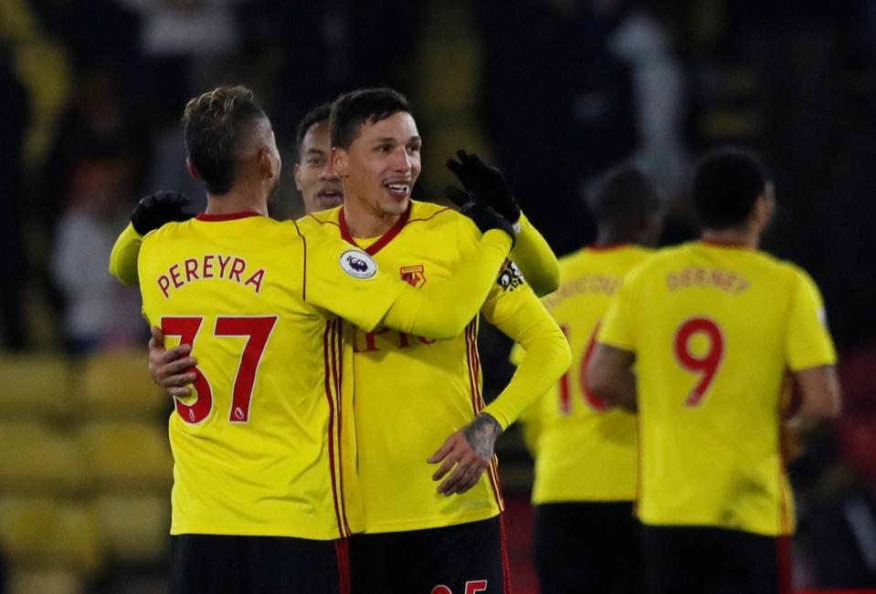  Roberto Pereyra and Jose Holebas celebrate