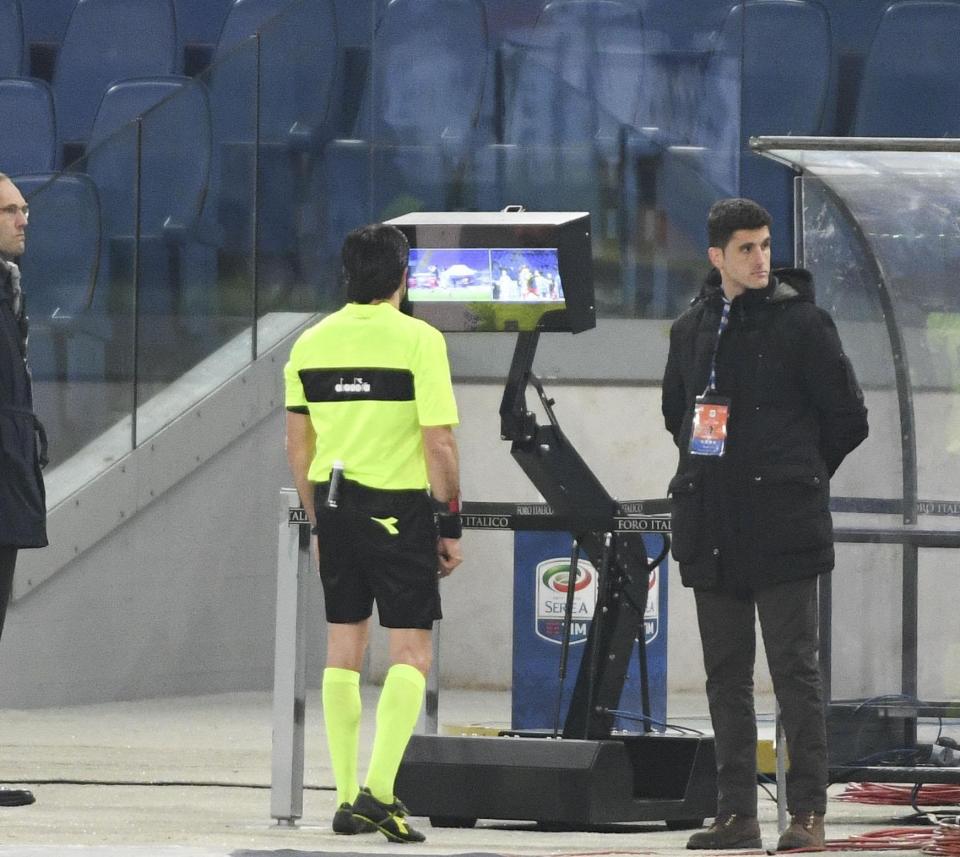  A referee in Italy checks VAR. Serie A has been using system in 2017-18 season