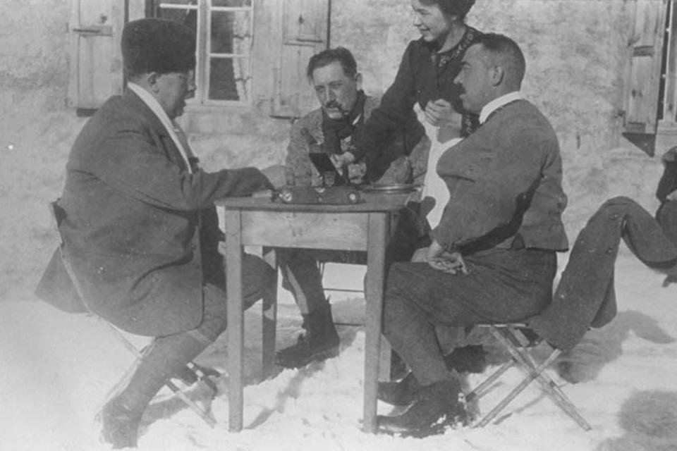  The Swedish curling team take a break and one enjoys a puff on his pipe