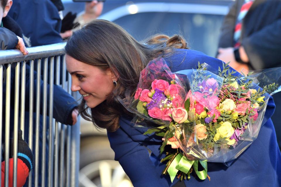  Kate thanks her royal fans for the beautiful flowers as she leaves the centre