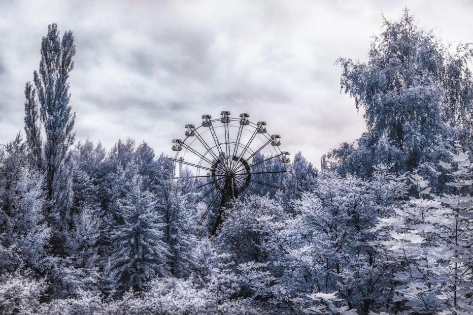 The images give the tragic site of an abandoned carnival in Chernobyl a magical quality