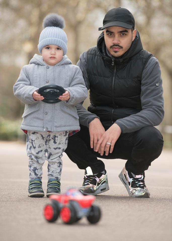  Halted . . . Idrees with his dad and his toy car