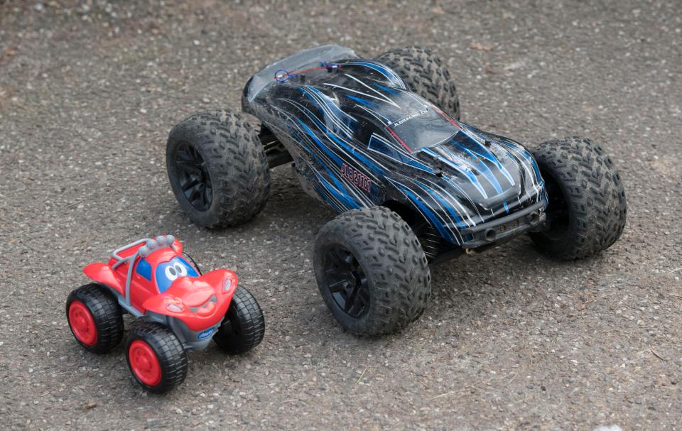  Driven out . . . Idrees had been playing with the small red toy car, pictured next to a larger RC car