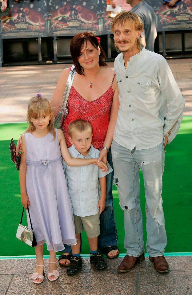  Mackenzie with his wife Lindsay and their children, Scout and Jude