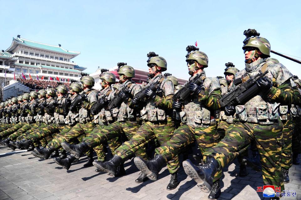  North Korea showed its might in a massive military parade on the eve of the Winter Olympics in South Korea