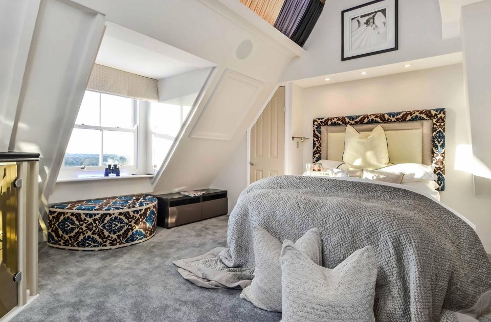  The master bedroom boasts awe-inspiring views of the south coast and Solent