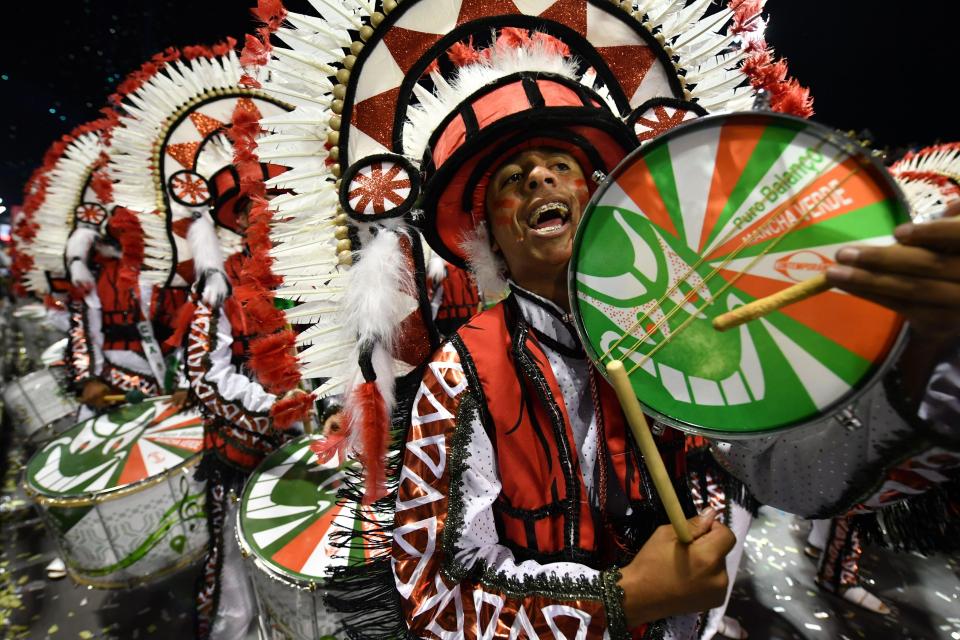  The city's samba schools traditionally fill the streets with dance and music during lavish parades