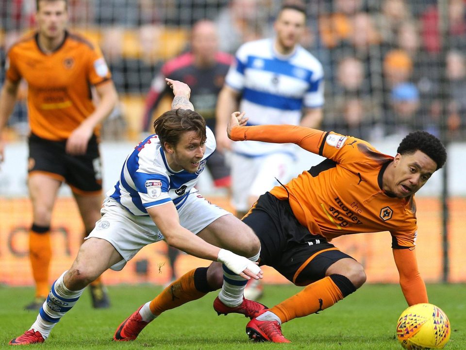  Queens Park Rangers' Luke Freeman and Costa in the thick of the action