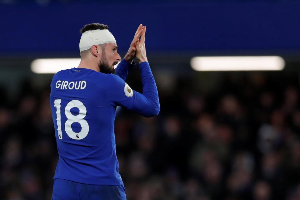  Olivier Giroud applauds Chelsea fans after full debut at Stamford Bridge