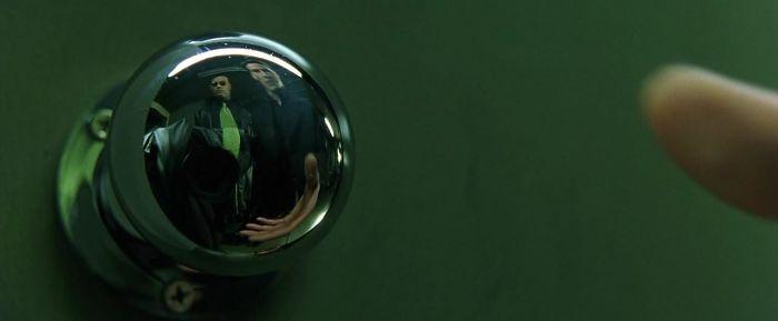  In Keanu Reeve's mindbending action flick The Matrix, the directors couldn't work out how to hide the camera in the reflection in the doorknob. So they threw a leather jacket over it to match Morpheus