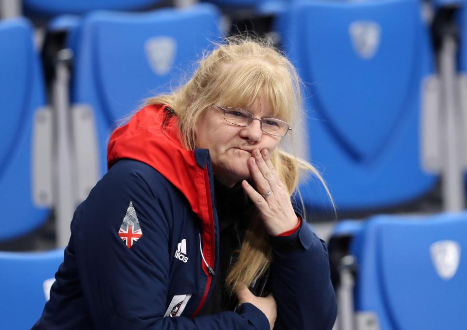  Elise Christie's mum Angela watches on and is clearly gutted as her daughter crashes out in Korea