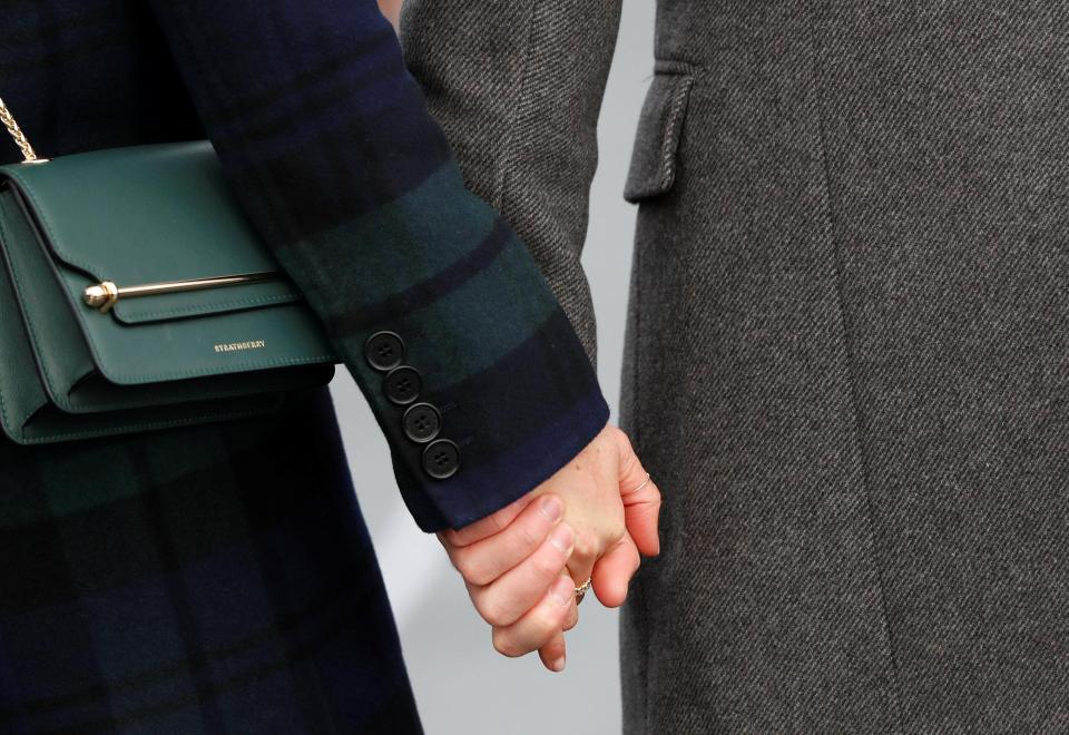  The engaged couple weren't shy to show their love as they held hands in Edinburgh