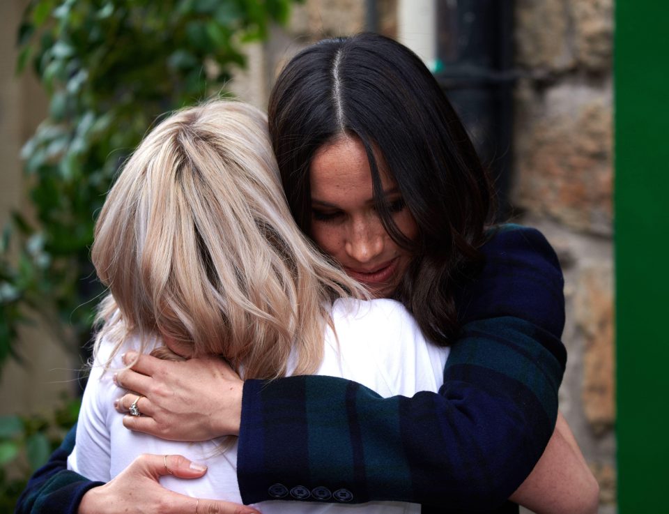  Meghan Markle embraced a charity worker who was ‘ deeply inspired’ by her 2015 UN Women’s speech during a visit to Edinburgh yesterday