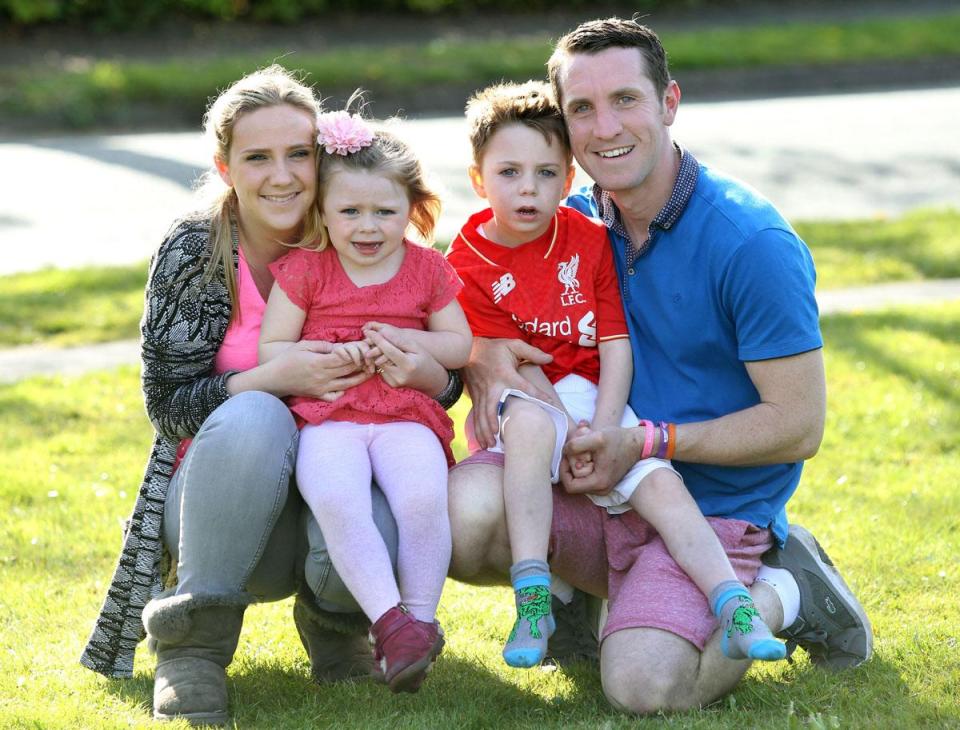  The Carroll family with their two children who suffer from Batten disease