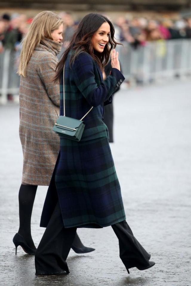  She also wore an over-the-shoulder bag in Scotland during an engagement