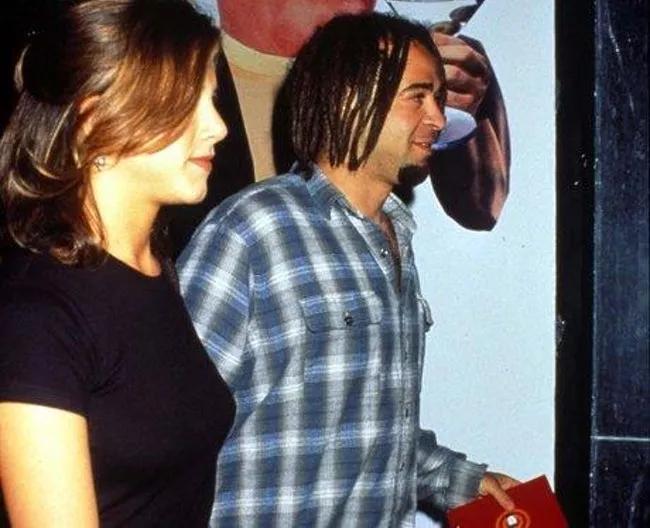  Jennifer Aniston pictured with rocker Adam Duritz whom she dated briefly in 1995