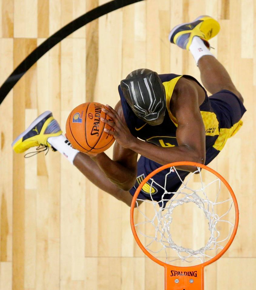 Victor Oladipo paid tribute to the cast of Black Panther by donning a movie mask for one of his dunks