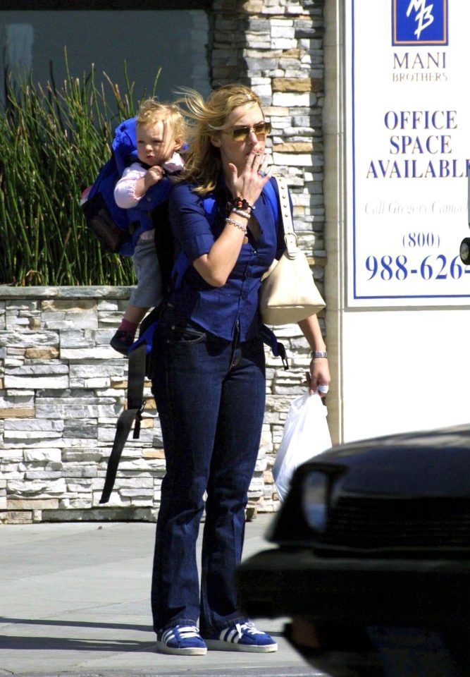  Kate Winslet was pictured having a cig while shopping with baby Mia in Santa Monica