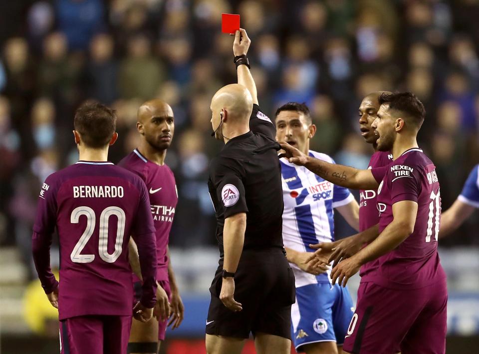  Fabian Delph was sent off but Anthony Taylor appeared to change his mind at the last minute after pulling out a yellow card at first