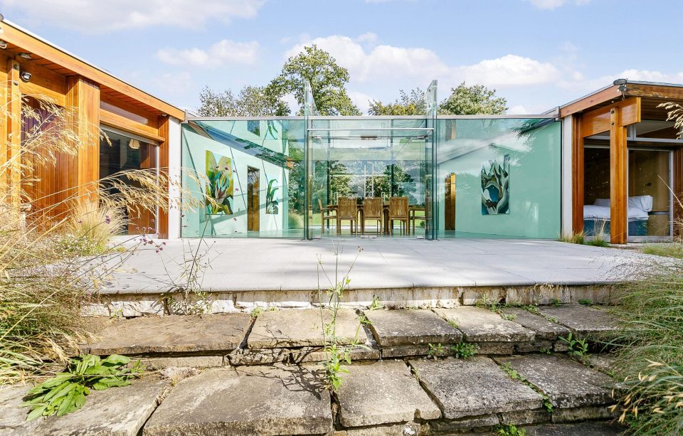  Perfect glass walls for making sure no-one is creeping up on you can be seen throughout the home