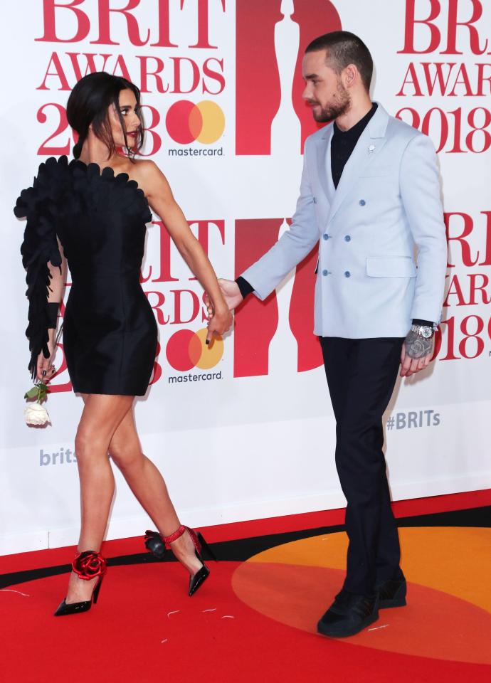  Cheryl gave Liam a look at one point as they headed off the red carpet